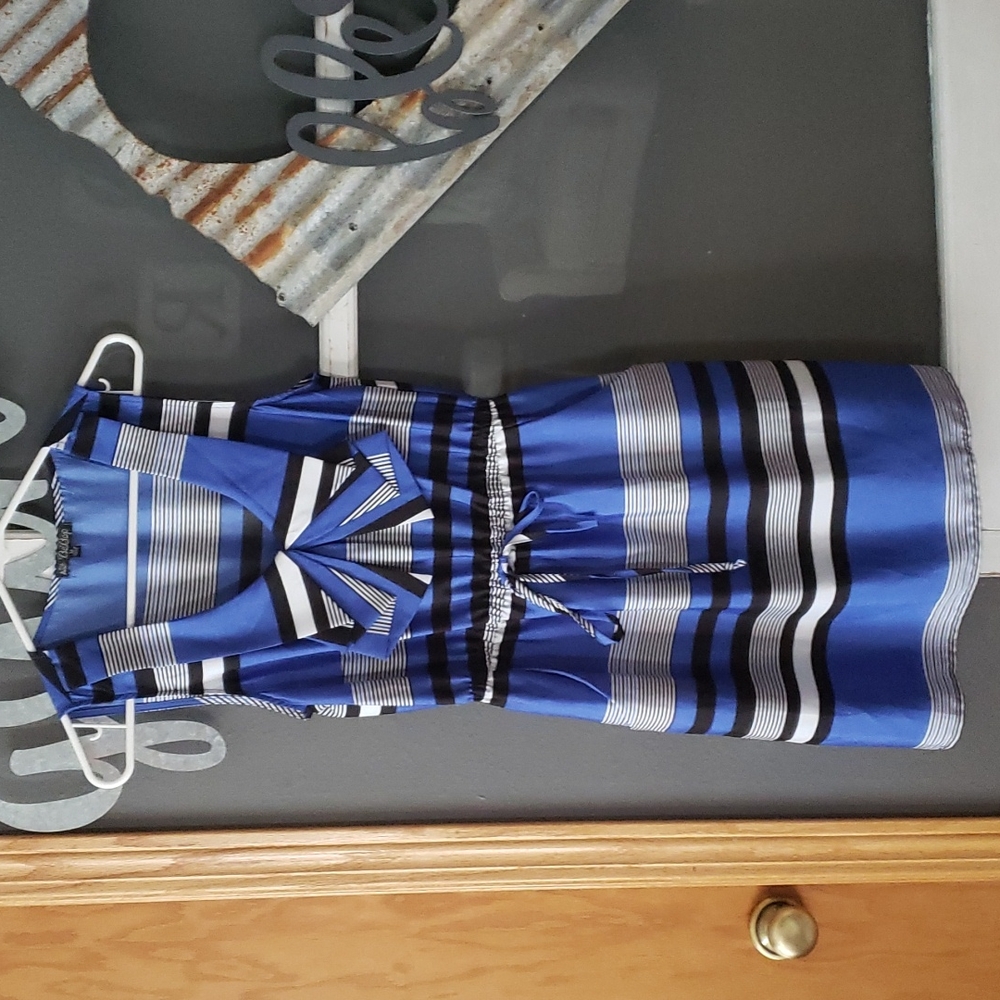 Cute short be bop dress with pockets.